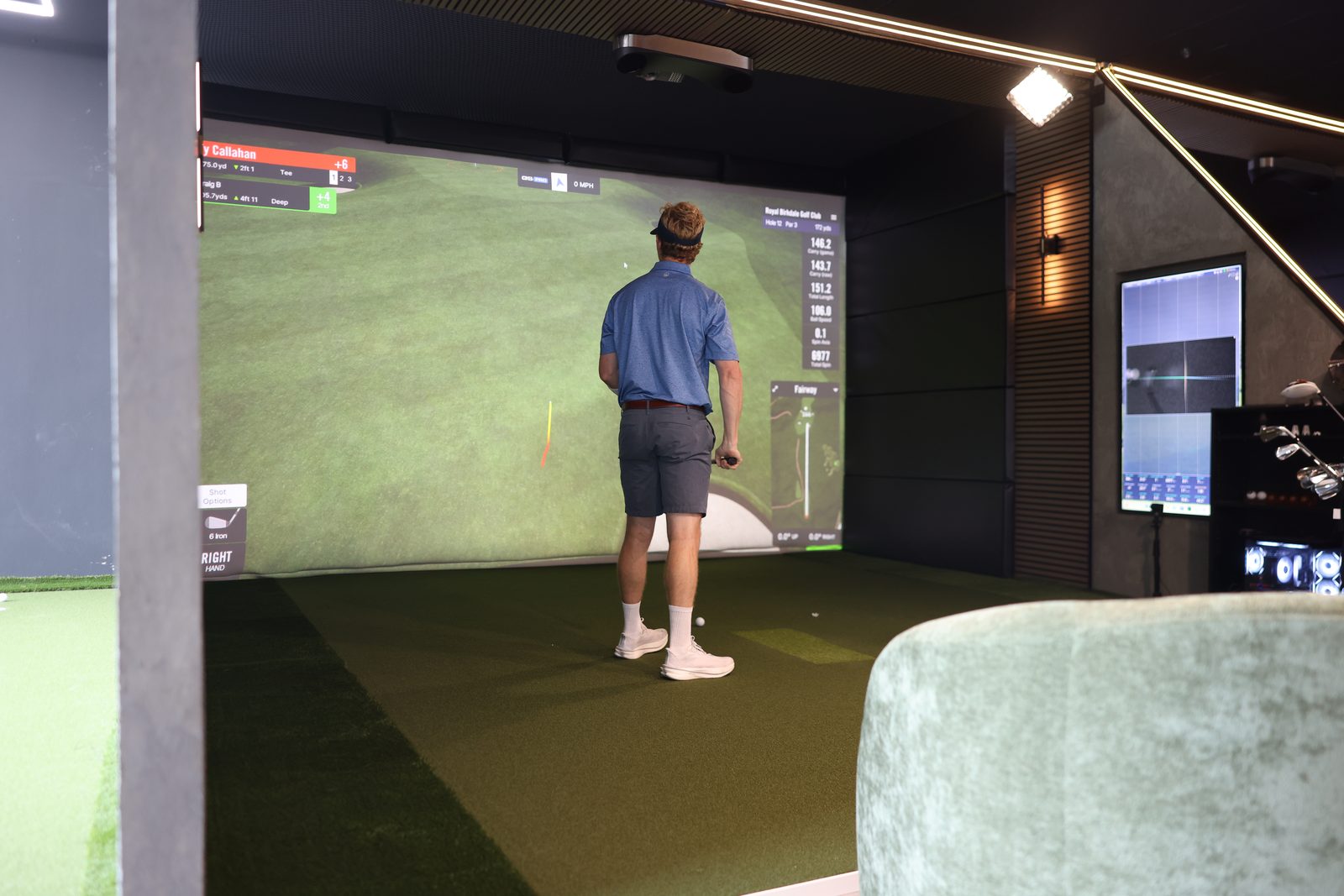 Royal Birkdale on the screen in a White Tee bay